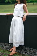 Mariposa A-line skirt with scalloped lace hem, styled full length