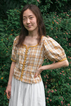 Palmier Linzer blouse with sweetheart neckline and shell buttons, full length