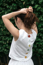 Sleeveless deadstock cotton top in Sweet Daisy, back view buttoned