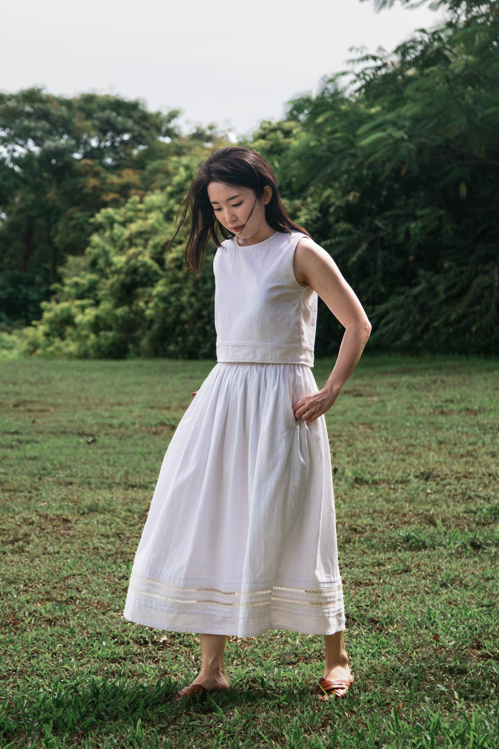 Sleeveless crop top in Sweet Daisy, side view showing fitted silhouette